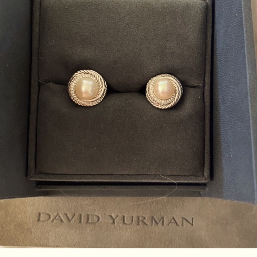 Pearl and diamond earrings set in sterling silver